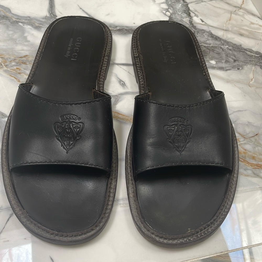 Gucci Embossed Logo Black Leather Slides